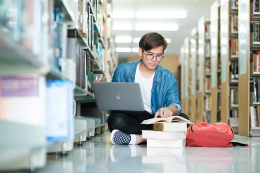 University student reviewing AI-generated notes on a laptop in a library