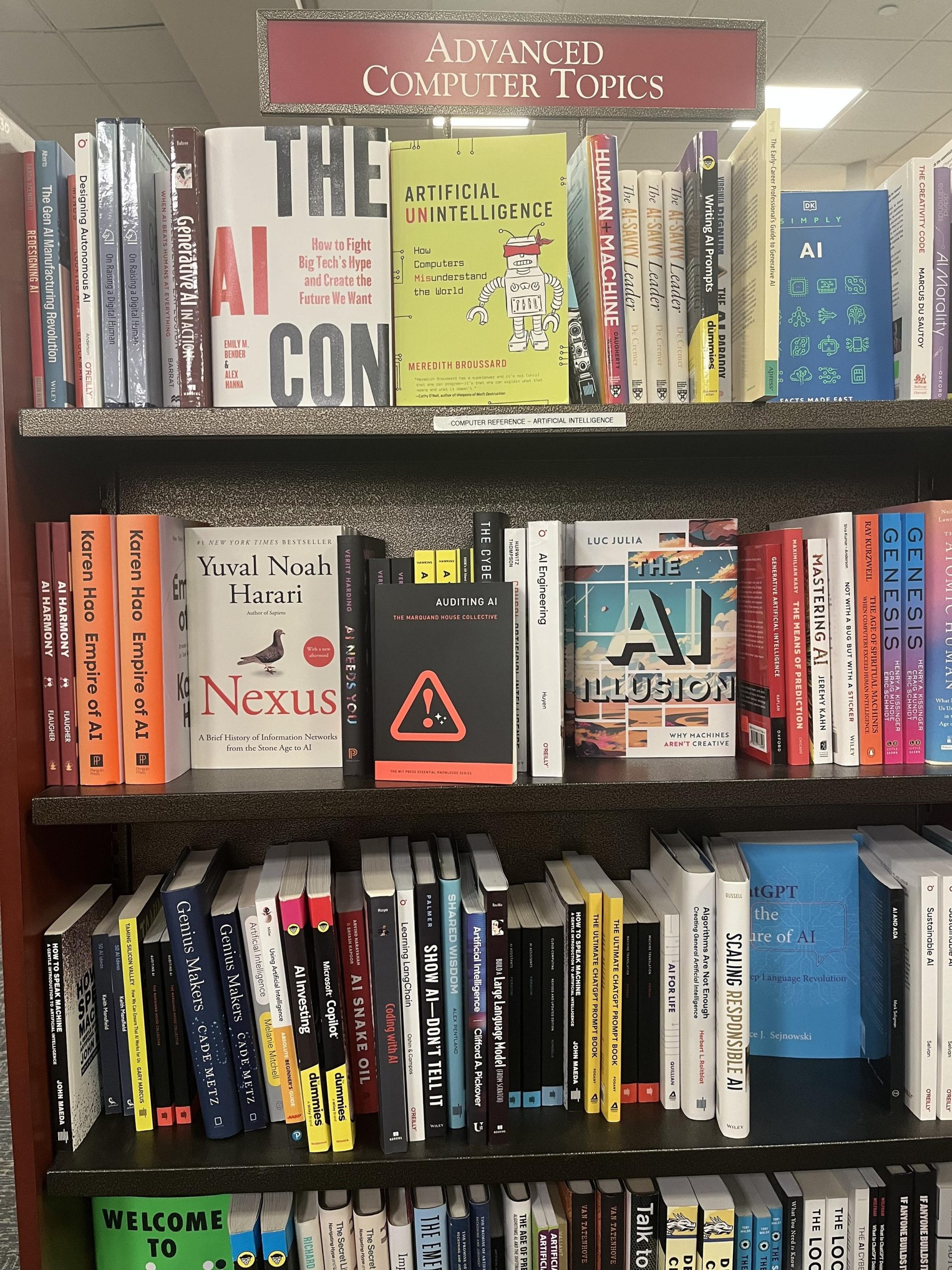 Books about AI and technology on a shelf