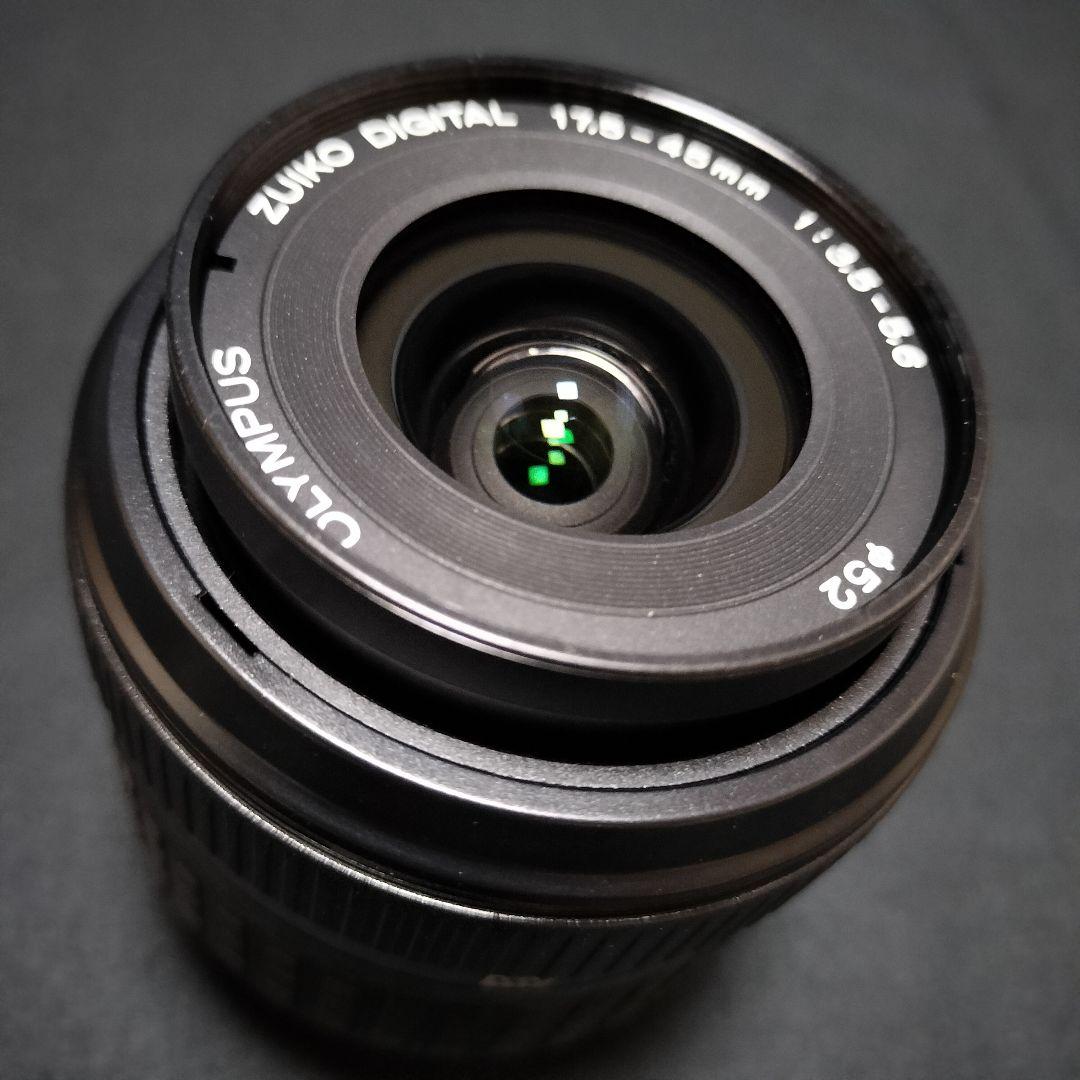Close-up of a camera lens with digital overlay