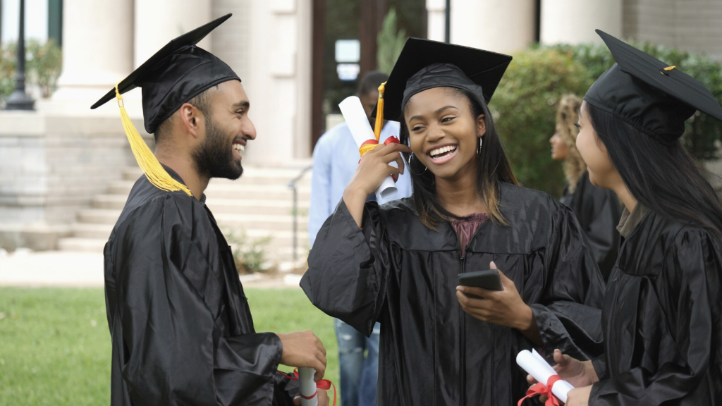 Graduates celebrating on a university campus