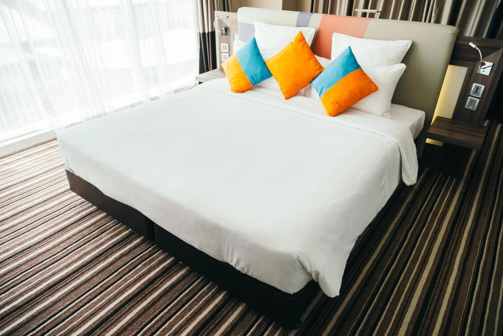hidden camera detector review - hotel room interior bed photography