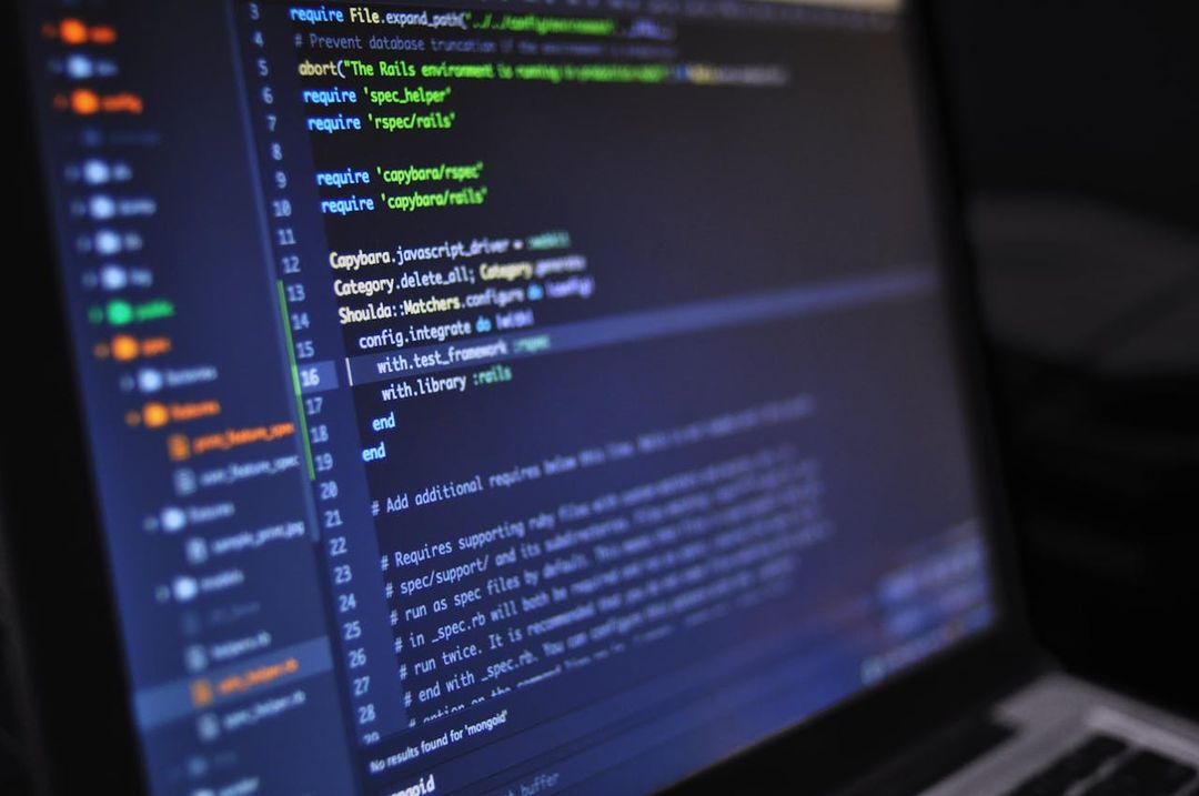 Developer reviewing programming code on screen